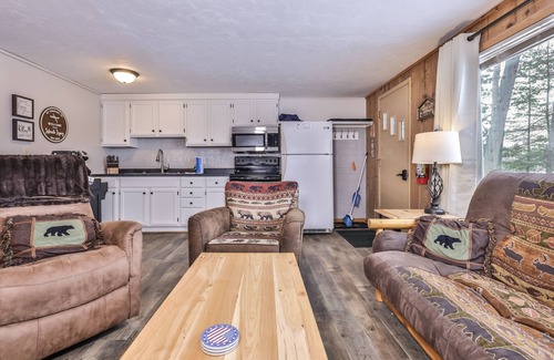 St Germain Cabin | Snowy lake-view cabin with fireplace, full kitchen, TV, dock, & DVD player