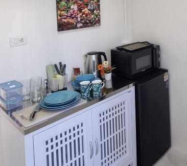 Ao Nang Apartment | Songbird Suites - Deluxe King Suite and Scooter