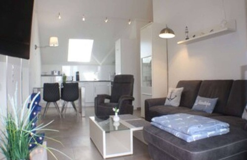 Kellenhusen Apartment | Sonnengarten 22 - Exclusive vacation apartment with a view of the sea and the pier.