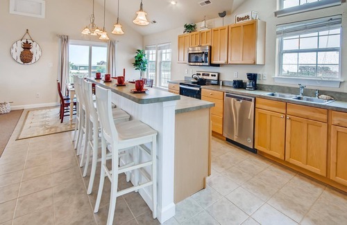 Wind Over Waves House | Soundside Dog Friendly Home w/Pool, Hot Tub, Putting Green, Community Boat Ramp