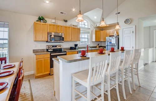 Wind Over Waves House | Soundside Dog Friendly Home w/Pool, Hot Tub, Putting Green, Community Boat Ramp