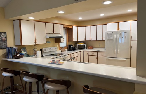 Traverse City House | South Lake Leelanau lakefront home, Kayaks/Bikes provided, Clean Sandy bottom n