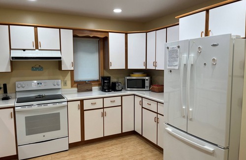 Traverse City House | South Lake Leelanau lakefront home, Kayaks/Bikes provided, Clean Sandy bottom n