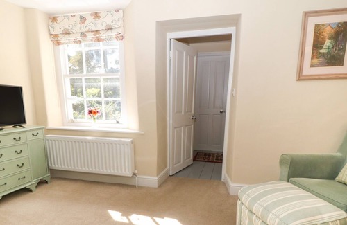 Rumleigh Cottage | SOUTH WING COTTAGE, pet friendly, with a garden in Bere Alston