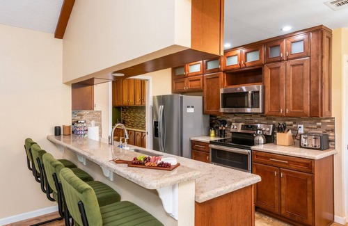 Blossoms Park House | Southwest Refresh- Heated Pool, Hot Tub, Game Room, Fire Pit, & Private Gym