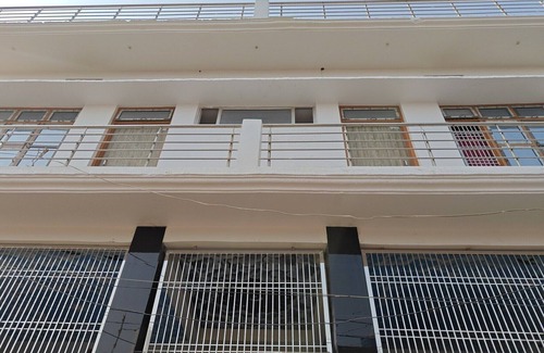 Faizabad House | Spacious 18-Bedroom Retreat in Sacred Ayodhya, Embraced by Comfort and Serenity.