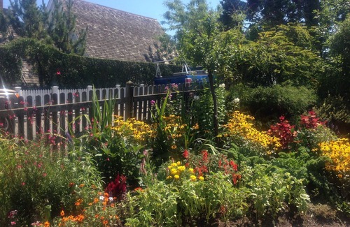 Provincetown Condo | Spacious 2-Bedroom Retreat in West End with Long Point Views & Stunning Garden.