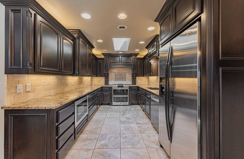 South Oklahoma City House | Spacious 4-bedroom House with a Pool, Hot Tub and a Large Backyard