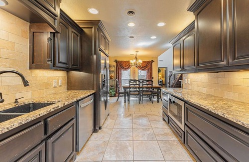 South Oklahoma City House | Spacious 4-bedroom House with a Pool, Hot Tub and a Large Backyard