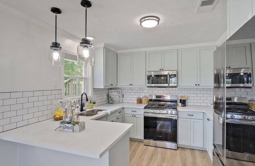 Magee House | “Spacious 4BR Oasis: Game Room, Luxe Baths & Fully Stocked Kitchen!”