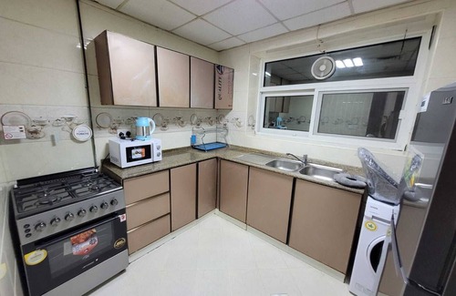 Sharjah Apartment | Spacious and Comfy 1 BR + 1 Living Room Apartment Near Sharjah University City