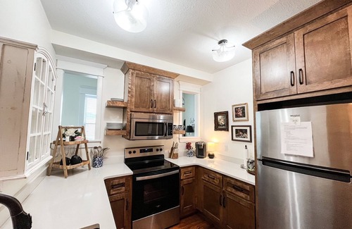 Excelsior Springs Condo | Spacious and Airy Loft/2 king beds/5 bed total/Overlooking Broadway Ave