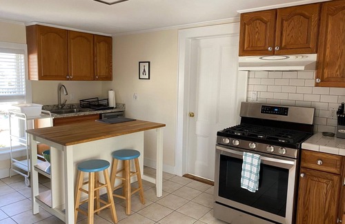 Greenport Apartment | Spacious apartment, 3 blocks to downtown and steps to fishing pier.