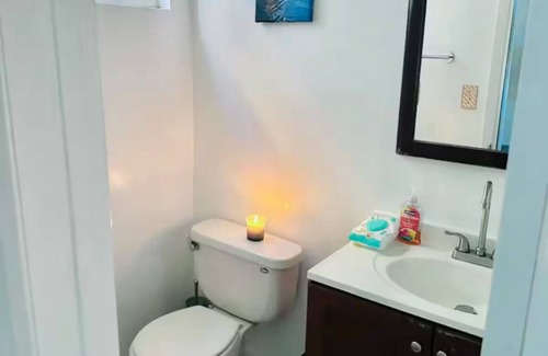 Seaside Apartment | Spacious bedroom with private bathroom