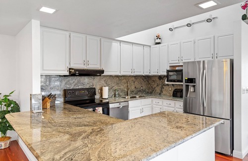 Coconut Grove Apartment | Spacious & Breezy 3 Bedroom Home with Ko'Olau Views and a Pool