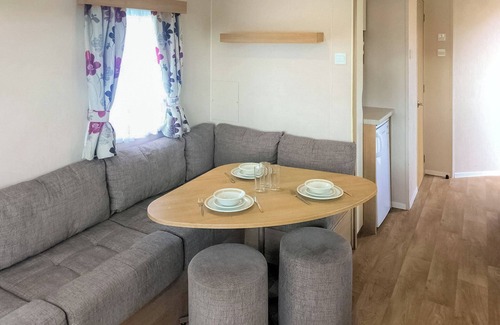 Skegness House | Spacious caravan with one double and two twin.