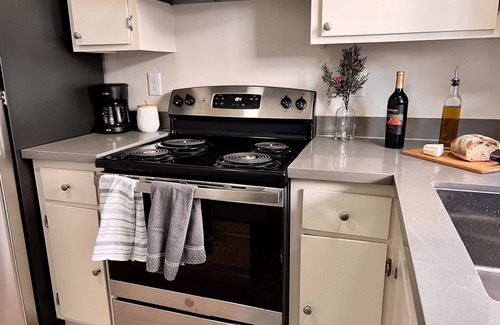 Downtown Burlingame Apartment | Spacious Downtown Burlingame Apt. with Driveway Parking & Private Patio 1/1