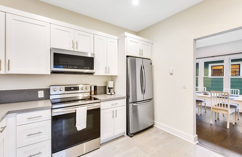 Wallingford House | Spacious home with fenced yard, patio, & sunroom - near UW/Green Lake
