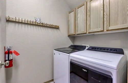 Redmond House | Spacious home with private deck, shared pool, and many resort amenities