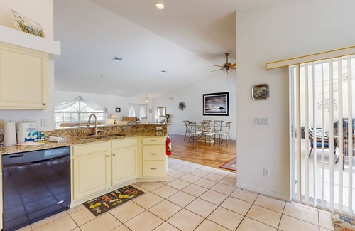 Biggar Villa | Spacious Lakefront Home with a Screened-In Pool in Exclusive Community