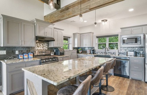 Wyandotte House | Spacious Lakefront Home w/hot tub, dock, & private ramp.