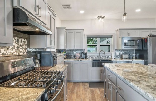 Wyandotte House | Spacious Lakefront Home w/hot tub, dock, & private ramp.
