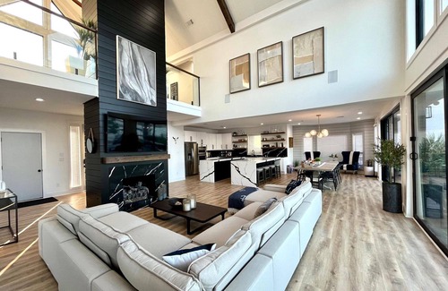 April Sound House | Spacious Luxury Lakefront Home with Pool and Jacuzzi, Firepit, and Game Room!