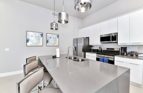 Reunion Hotel | Spacious Modern Condo with Pool Table, Rooftop Terrace and Large Loft. Reunion Resort Water Park Access near Disney at Spectrum Resort Orlando by Rentyl - B8 #234