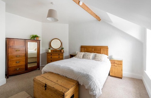 Beer Apartment | Spacious, period building top-floor flat in heart of Beer, 3 minute walk to beach