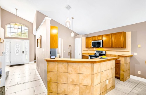 Lindfields House | Spacious pool home near Disney with enclosed yard, game room, & washer/dryer