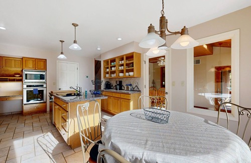 Monument House | Spacious & sunlit mountain retreat with patio, fireplace & great nature views