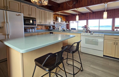 Frankfort House | Spacious vacation gem on Crystal Lake w/gas fireplace, WiFi, central AC, firepit