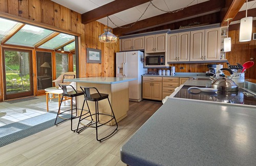 Frankfort House | Spacious vacation gem on Crystal Lake w/gas fireplace, WiFi, central AC, firepit