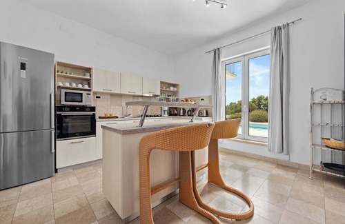 Rakalj Villa | Spacious Villa with Wonderful Seaview, Heatable Pool, 3 min to the Beach