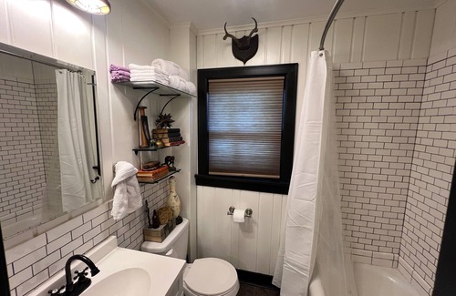 College Hill Apartment | Speakeasy-Inspired Carriage House in Charming College Hill Neighborhood