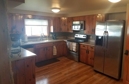 Higgins Lake House | Spectacular Lake Front Home on Beautiful Higgins Lake with Amazing Sunset Views