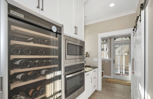 Gilford House | Spectacular Winnipesaukee Point Lot With Custom Home and Separate Guest Space