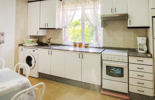 Muros Apartment | Spend a wonderful vacation in this inviting apartment by the sea.