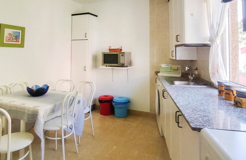 Muros Apartment | Spend a wonderful vacation in this inviting apartment by the sea.