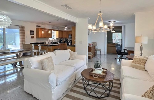 Dolphin's Cove House | Sprawling, private pool oasis with plenty of room for R&R! Pet Friendly!