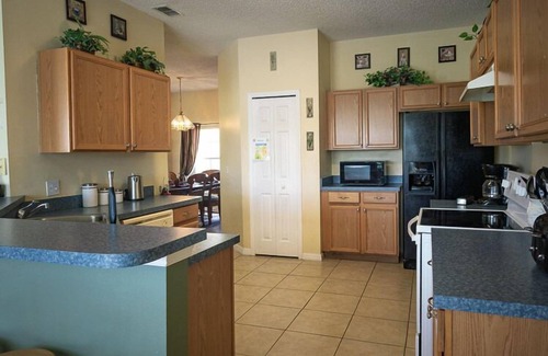 Crescent Lakes Villa | Sprawling Private Pool Home near Disney w/Pond Views & Game Room