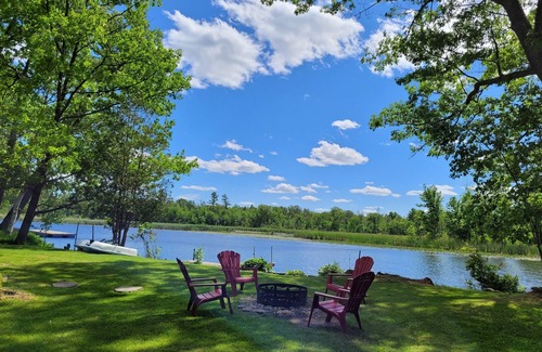 Campbellford Cottage | Start each morning on the porch with warm sunshine and beautiful waterfront view