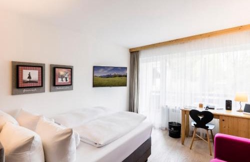 Garmisch-Partenkirchen Hotel | Staudacherhof in Garmisch-Partenkirchen I Blick aufs Zugspitzmassiv I einzigartige Bayurvida Küche