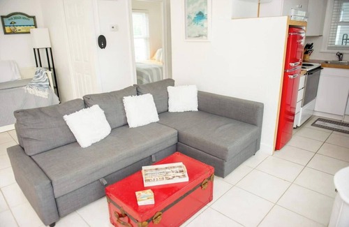 St. Petersburg - Clearwater Cottage | Stay steps from the sand in this charming single-family home. Enjoy exclusive beach access at Sunburst Inn, featured on HGTV. Cozy comfort for up to 4, and an unbeatable location on the Gulf. Perfect for a romantic escape or small family getaway.