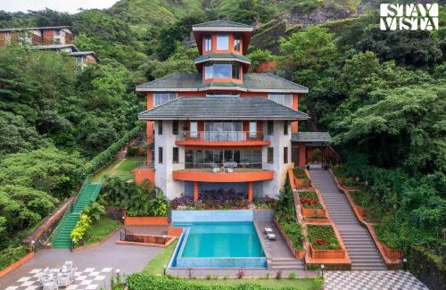 Kune N.m. Villa | StayVista at Airhill with Pool, Bonfire, WiFi