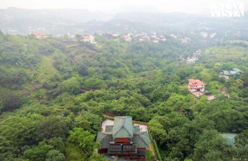 Kune N.m. Villa | StayVista at Airhill with Pool, Bonfire, WiFi