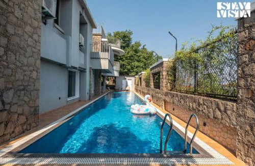 Kune Village Villa | StayVista at Seraphim Peak with Pool & Views