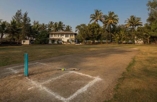 Karjat Villa | StayVista's Casa Blanca - Modern elegance with a pool, spacious lawn & diverse activities