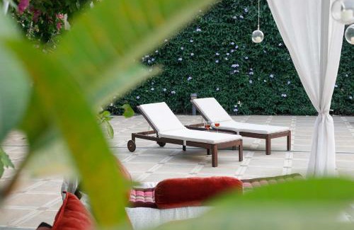 Kune Village Villa | StayVista's Le Sutra Great Escapes - Geometrica - Artistic Rooms, Mountain View, Pool, and Gazebo Retreat