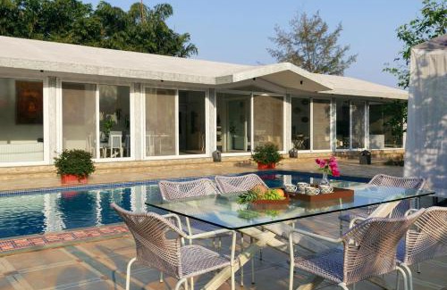 Kune Village Villa | StayVista's Le Sutra Great Escapes - Geometrica - Artistic Rooms, Mountain View, Pool, and Gazebo Retreat